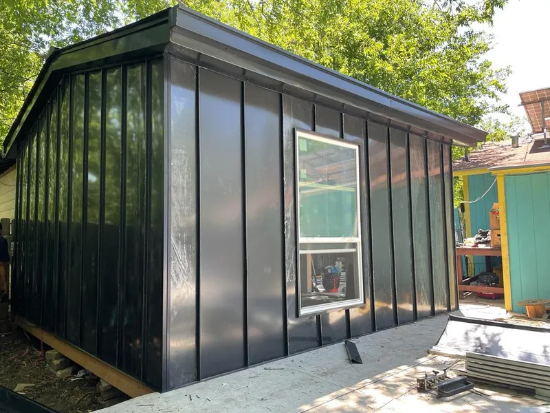 Black standing seam metal wall panels for Roof Inspection in Tualatin